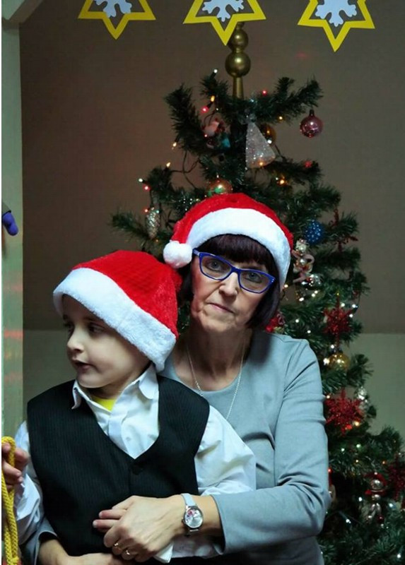 Podopieczni Specjalnego Ośrodka Szkolno-Wychowawczego przy Wigilijnym stole