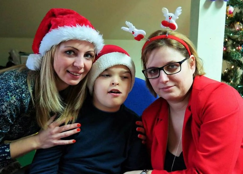 Podopieczni Specjalnego Ośrodka Szkolno-Wychowawczego przy Wigilijnym stole