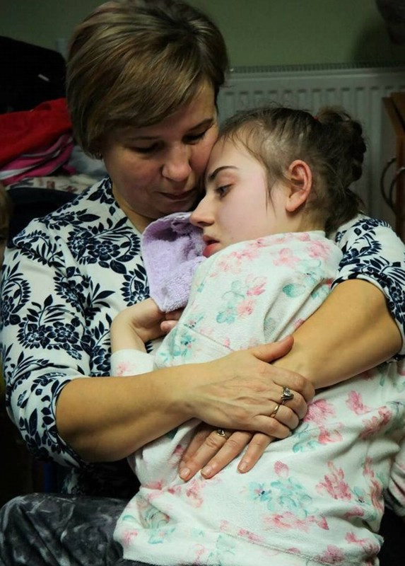 Podopieczni Specjalnego Ośrodka Szkolno-Wychowawczego przy Wigilijnym stole