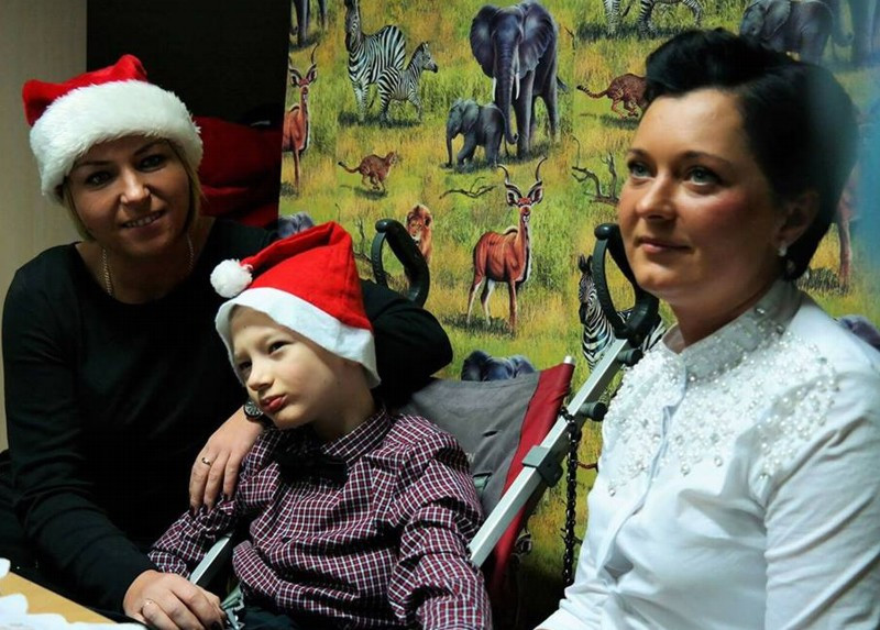 Podopieczni Specjalnego Ośrodka Szkolno-Wychowawczego przy Wigilijnym stole